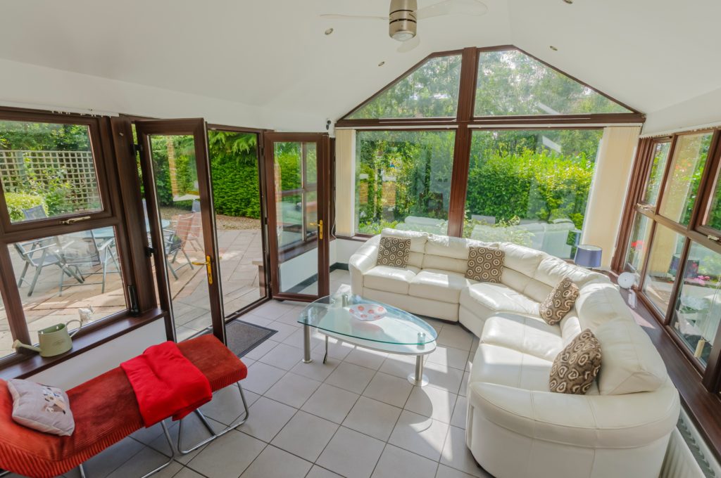 solid conservatory roof Warwick